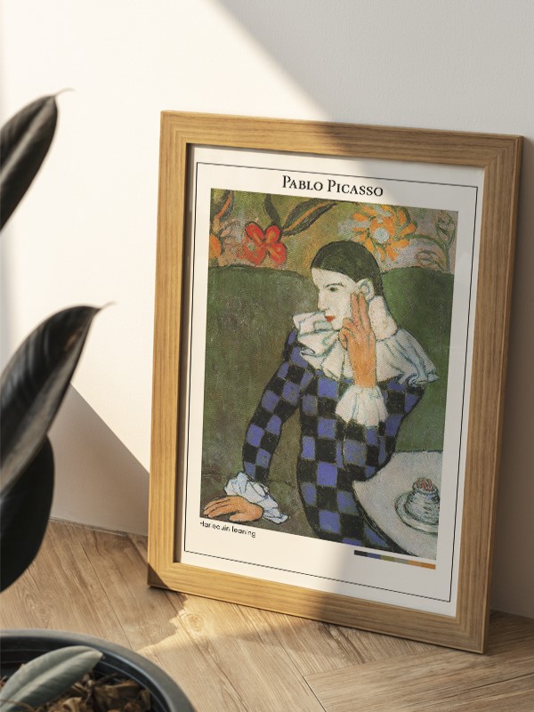 Pablo Picasso Harlequin leaning Poster