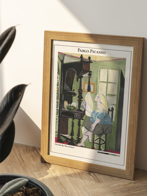 Pablo Picasso Woman by the dresser Poster