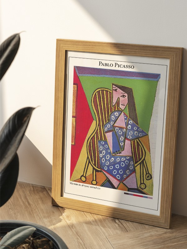 Pablo Picasso Woman in striped armchair Poster
