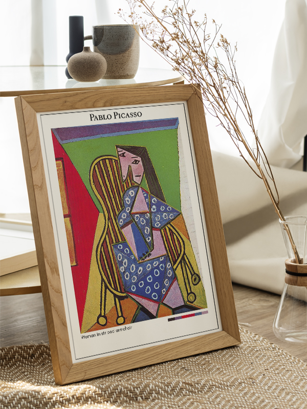 Pablo Picasso Woman in striped armchair Poster