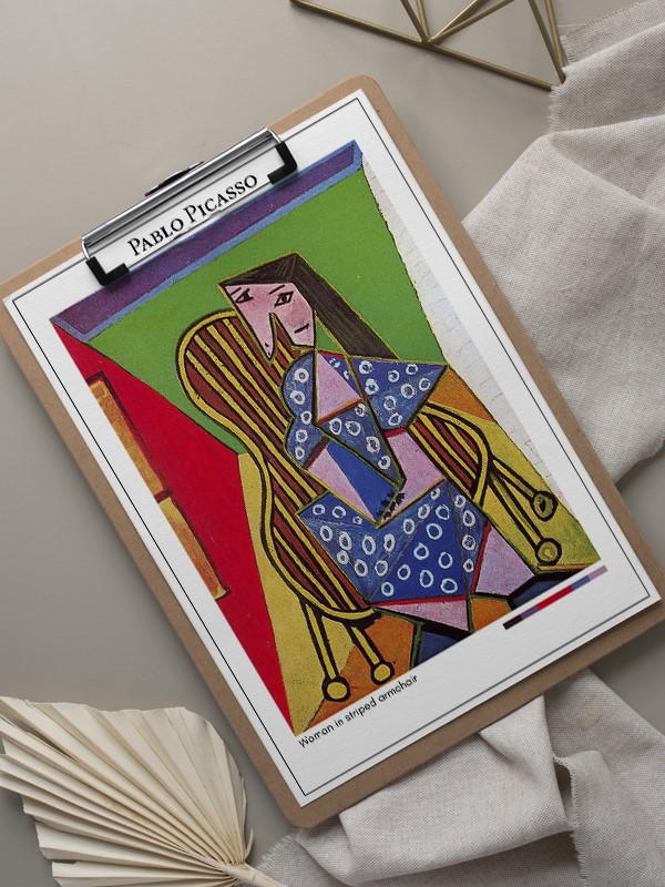 Pablo Picasso Woman in striped armchair Poster