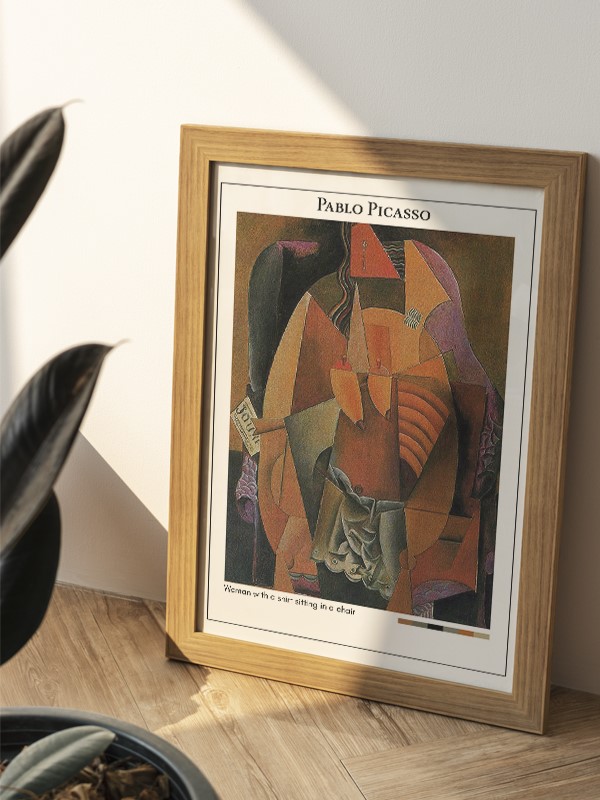 Pablo Picasso Woman with a shirt sitting in a chair Poster